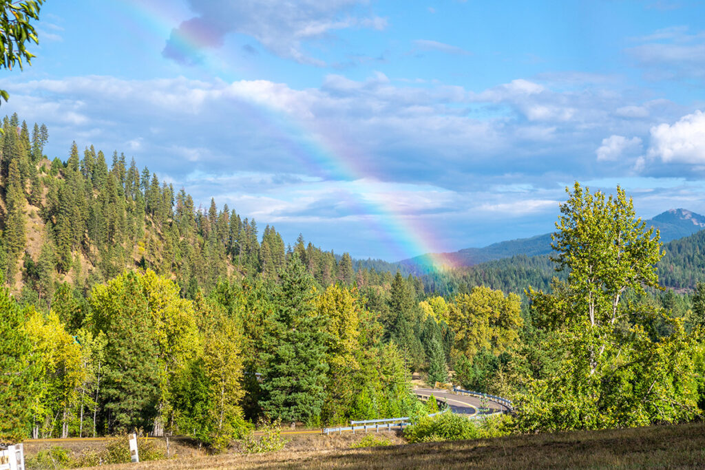 Garden Valley Idaho with rainbow and trees