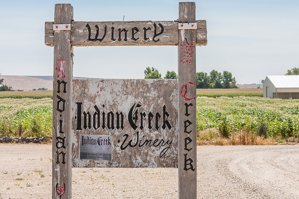 Indian Creek Winery in Kuna, Idaho sign with open fields