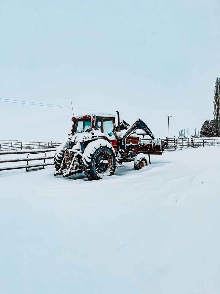 A tractor in the snow