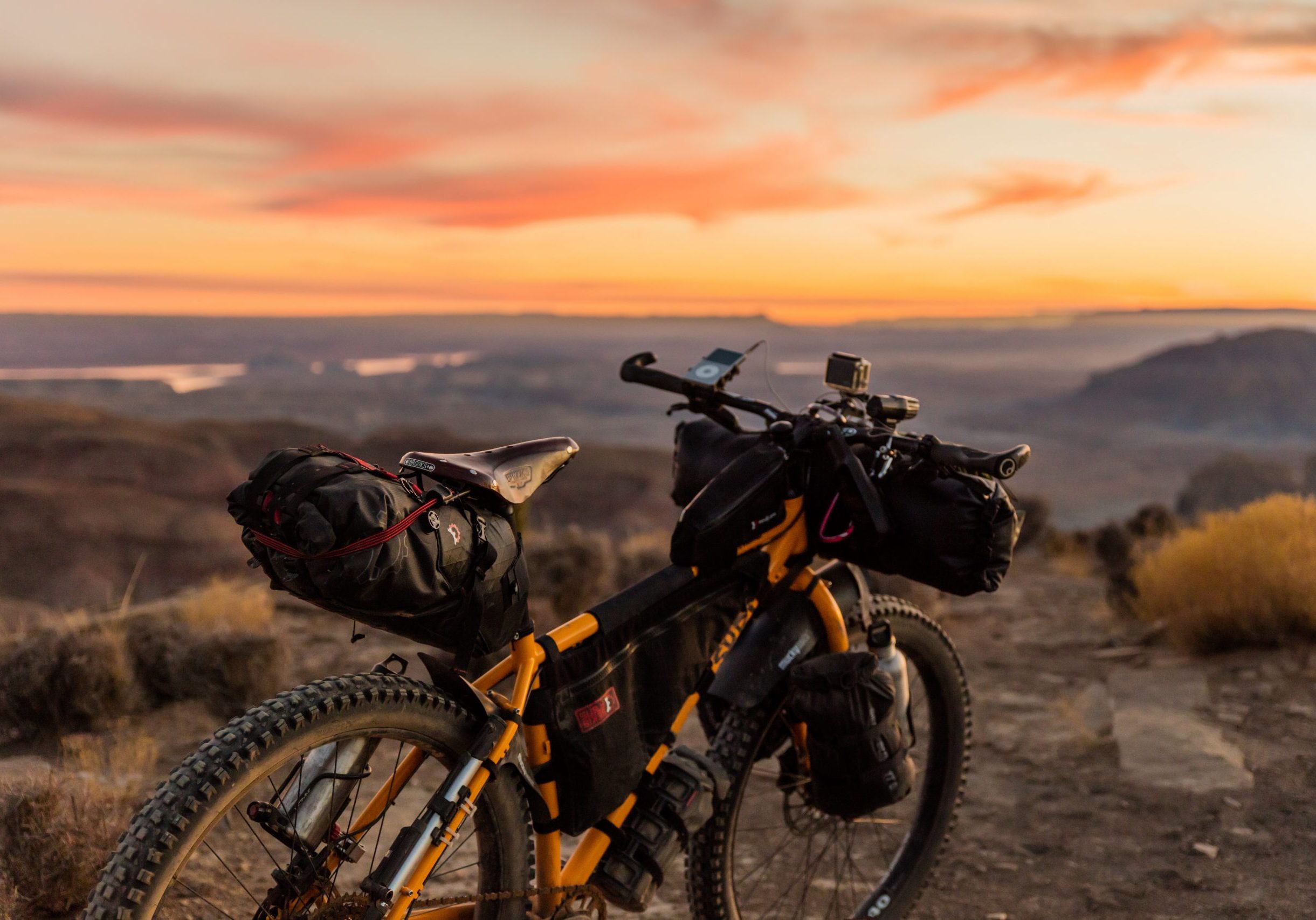 Mountain bike set against a pink sunset overlooking Boise Idaho.